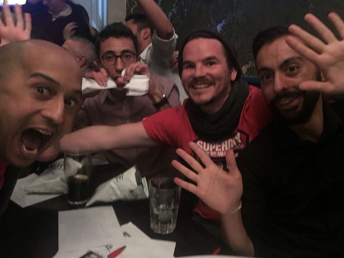 Informal London Gays group selfie at a social event